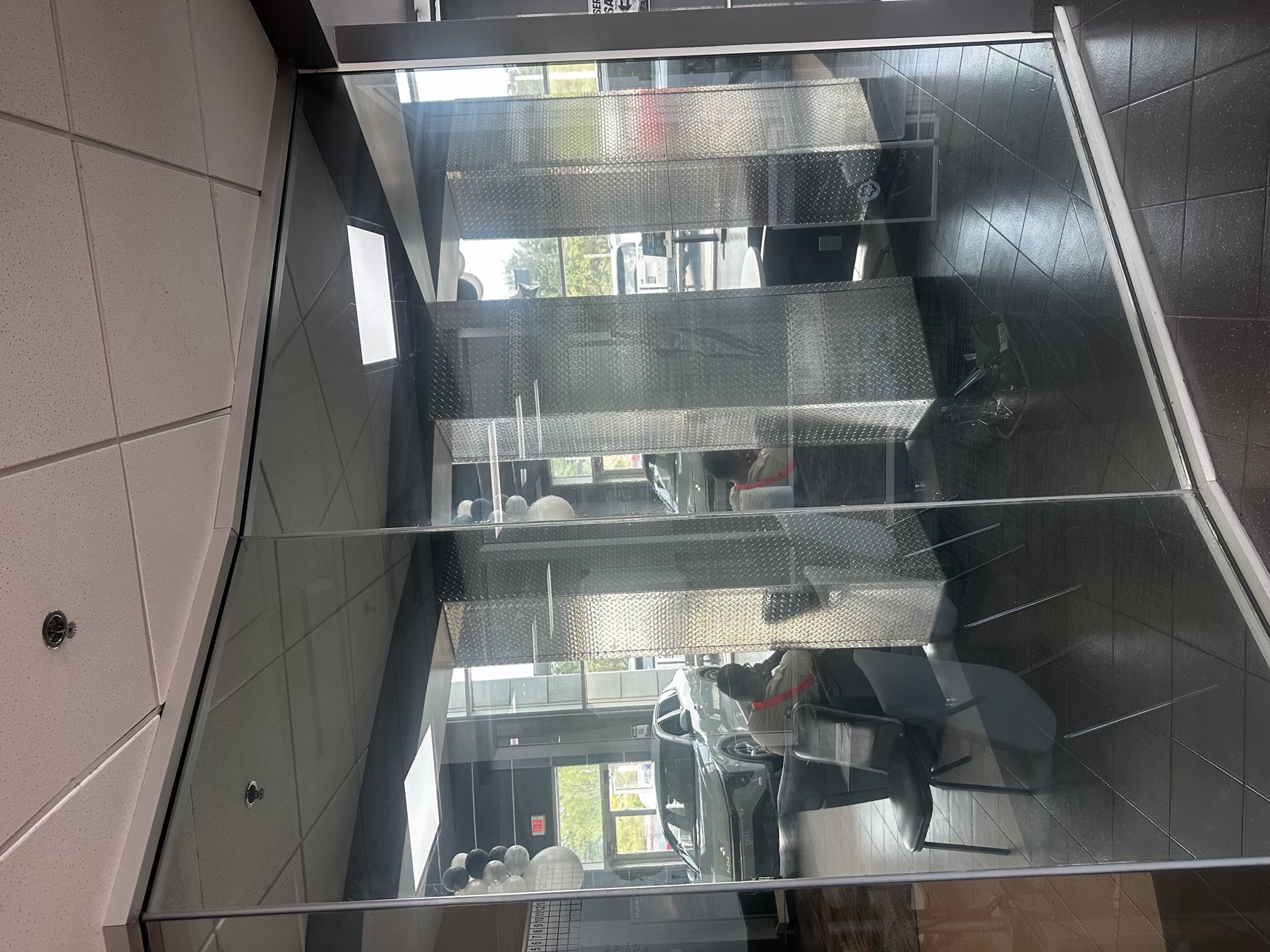 Interior glass office with reflective privacy film
